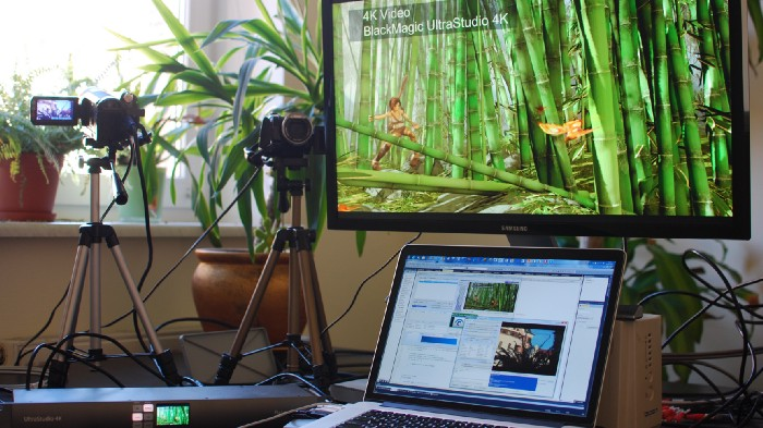 cameras and monitors on the table 