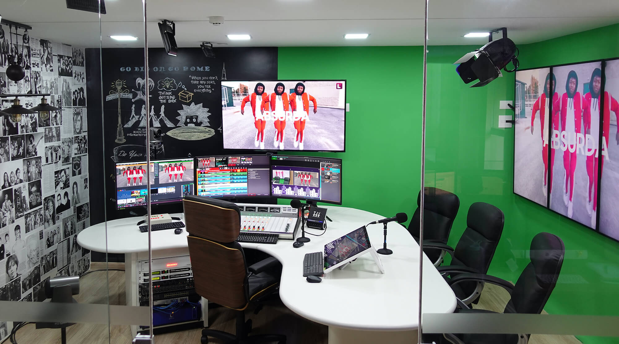 Video studio with monitors and microphones on the table