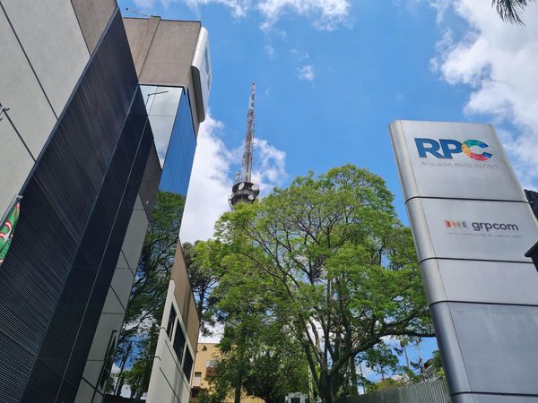 City view with buildings, trees and RPC logo